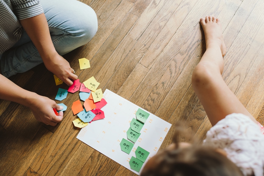 Homeschool Family Working On Math At Home